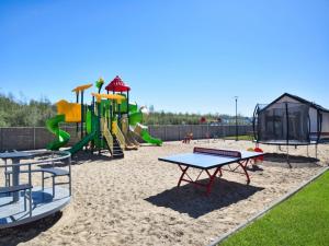 Ο χώρος παιχνιδιού για παιδιά στο Comfortable, single-story holiday homes