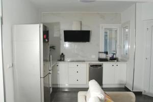 Η κουζίνα ή μικρή κουζίνα στο Luxe Loma 2