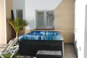 Ένα ή περισσότερα κρεβάτια σε δωμάτιο στο Luxe Loma 2 +17 φωτογραφίες