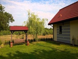 Zahrada ubytování Holiday Home in Kolczewo near Baltic Beaches + 15 fotografií
