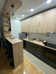 Kuchyň nebo kuchyňský kout v ubytování Mija