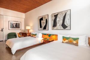 Postel nebo postele na pokoji v ubytování Hotel Magdalena