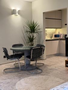 Køkken eller tekøkken på Glass & Charme - Central Suite