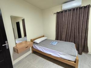 Ένα ή περισσότερα κρεβάτια σε δωμάτιο στο شاليه 3 غرف Lasirena Mini Egypt Resort Ain Sokhna Families only +24 φωτογραφίες