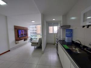 Nhà bếp/bếp nhỏ tại Apartamento 2 Quantos com ar Condicionado na quadra da Praia de Itaparica