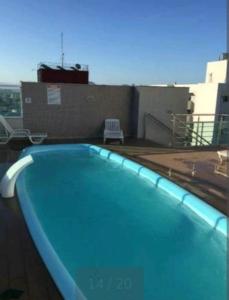 Hồ bơi trong/gần Apartamento 2 Quantos com ar Condicionado na quadra da Praia de Itaparica