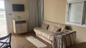 Χώρος καθιστικού στο Los Kinotos Mini Casa Chuy