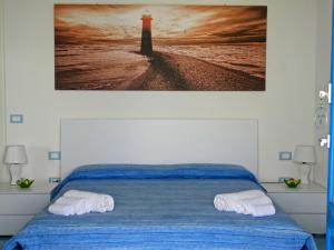 Postel nebo postele na pokoji v ubytování Top Residence Marcella