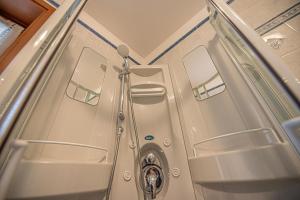 a bathroom with a washer and dryer at Chalet Edera Myholidaylivigno in Livigno +273 photos