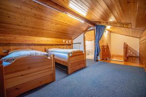 Ένα ή περισσότερα κρεβάτια σε δωμάτιο στο Chalet Edera Myholidaylivigno