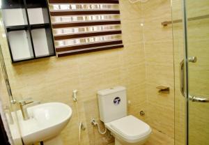 Koupelna v ubytování Yommite Suites & Apartments