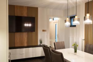 Μια τηλεόραση ή/και κέντρο ψυχαγωγίας στο Appartement Dollnig