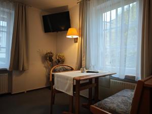 Телевизор и/или развлекательный центр в Pension Villa Sarah