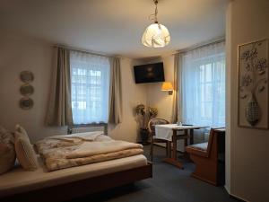 Кровать или кровати в номере Pension Villa Sarah