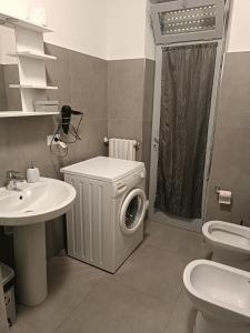 Koupelna v ubytování Dilman appartamento + 25 fotografií