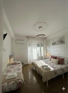 Postel nebo postele na pokoji v ubytování Central City Apartment of Asti