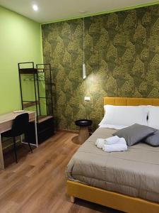 Giường trong phòng chung tại Marilù Accoglienza del Sud