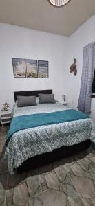 Ένα ή περισσότερα κρεβάτια σε δωμάτιο στο Brachil 1