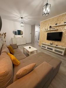 Et tv og/eller underholdning på Adora Residence Modern Suite