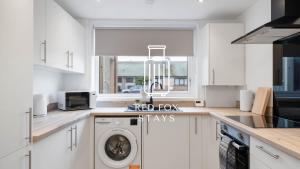 Køkken eller tekøkken på The Den at the Harbour