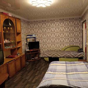 Postel nebo postele na pokoji v ubytování Квартира