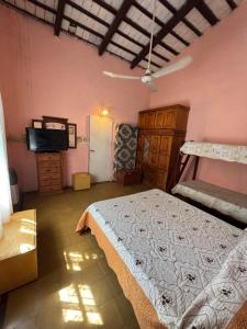 Postel nebo postele na pokoji v ubytování Pochito