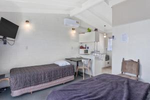 Η κουζίνα ή μικρή κουζίνα στο NauMai Motel