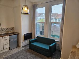 Posezení v ubytování Ground Floor 1 BDR Flat in Norwood near Station