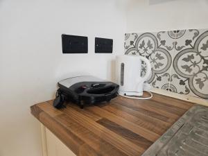 TV a/nebo společenská místnost v ubytování Ground Floor 1 BDR Flat in Norwood near Station + 15 fotografií