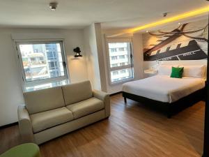 Postel nebo postele na pokoji v ubytování ibis Styles Montevideo Biarritz + 95 fotografií