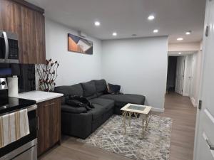 Posezení v ubytování YYC Cozy Suites