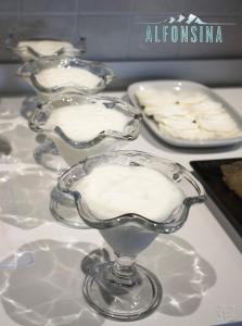 two glass dishes on a table with a plate of food at Hotel La Alfonsina in Santibáñez de Villacarriedo