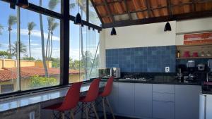 Kuchyň nebo kuchyňský kout v ubytování FAROL BEACH Suítes + 33 fotografií