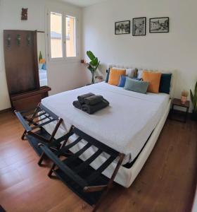 Кровать или кровати в номере Chez Nous