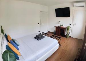 Кровать или кровати в номере Chez Nous +5 фотографий