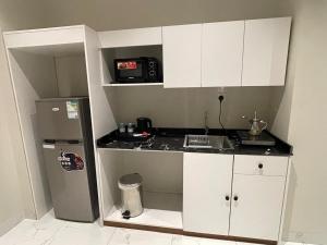 Kuchyň nebo kuchyňský kout v ubytování فندق جراند جرين