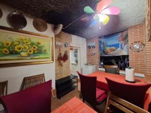 Una televisión o centro de entretenimiento en Villa Tarsia