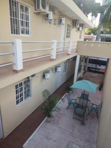 En balkon eller terrasse på Jardines del Mar by La Cultura Suites - Boutique Studios Playa del Carmen