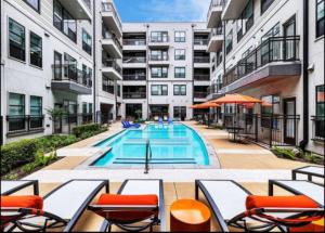 an apartment with a swimming pool in a building at Marina Retreat, Near Beaches&SoFI in Los Angeles