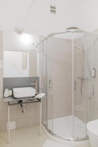 Et badeværelse på Mieszkania w Browarze