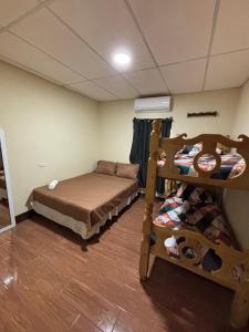 Postel nebo postele na pokoji v ubytování Casa Villaflores Zapotitlán