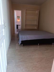 En eller flere senge i et værelse på Casa Praia Abais - Estância SE + 11 billeder