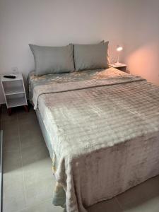 Postel nebo postele na pokoji v ubytování Pousada Oito Mares + 5 fotografií