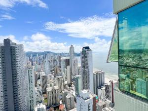 a view of a city from a skyscraper at Alto Padrão - Balneário Camboriú in Balneário Camboriú