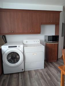 Køkken eller tekøkken på Belle chambre 2 pas Hôpital UQTR Services + 8 billeder