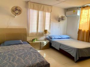 Ένα ή περισσότερα κρεβάτια σε δωμάτιο στο Casa campestre Magyli +23 φωτογραφίες