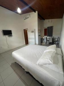 En eller flere senge i et værelse på Morada do vento