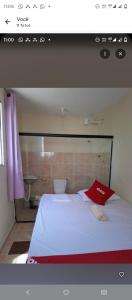 Postel nebo postele na pokoji v ubytování Pousada Lirios