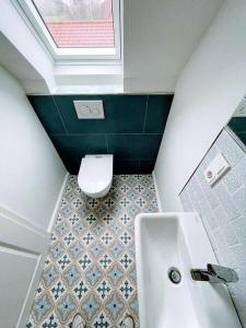 Ένα μπάνιο στο Ferienwohnung-Friesenblick