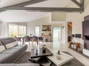 a living room with a couch and a table at DUXCAAR Mervent in Mervent